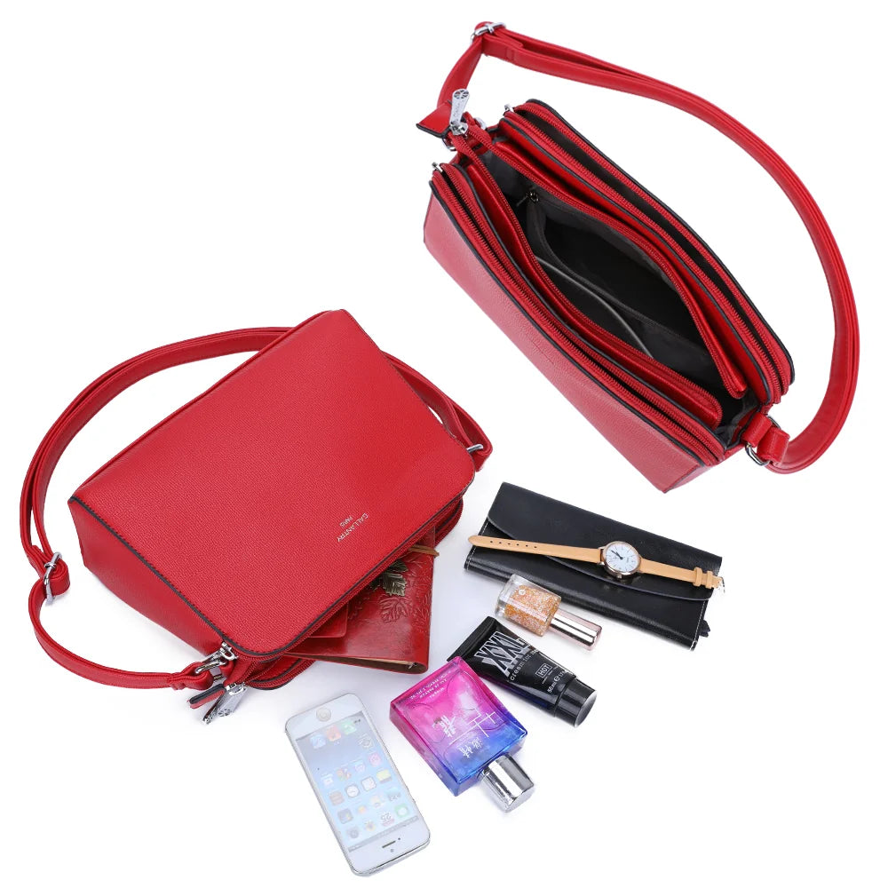 Intérieur du Gallante rouge : plusieurs compartiments zippés pour ranger téléphone, carnet et maquillage – réf. G-7432-2