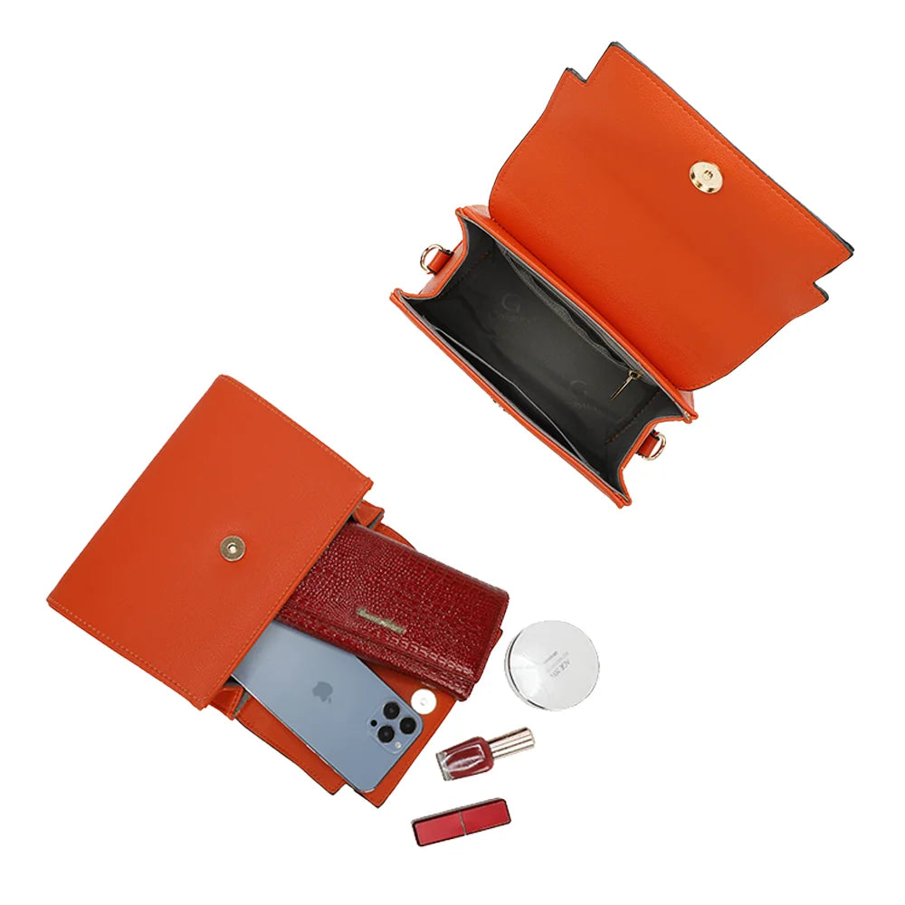 Intérieur du Giuliana orange : rabat à fermoir aimanté, place pour téléphone, portefeuille et maquillage – réf. M-9382-1