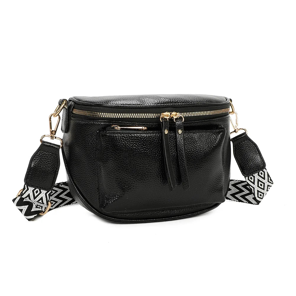 Glamour Shiny noir vu de trois quarts : forme demi-lune compacte et double tirette sur le zip du dessus – réf. Z-83047-1