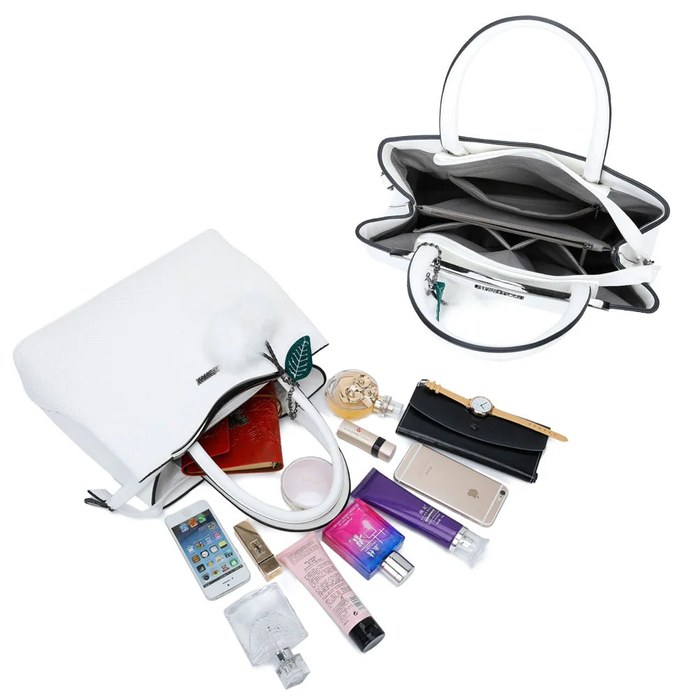 Intérieur du Hailey blanc : plusieurs compartiments dont un central zippé, pour vos essentiels – réf. G-7329-1