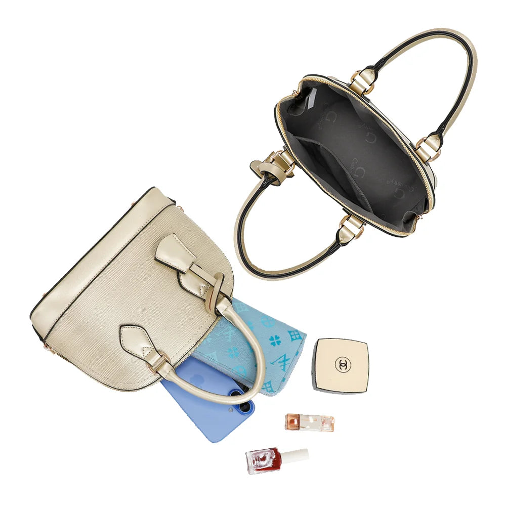 Intérieur de L'Éclat Mini bronze : compartiment zippé avec poche plaquée pour le téléphone et l’essentiel – réf. DQ-8596-5