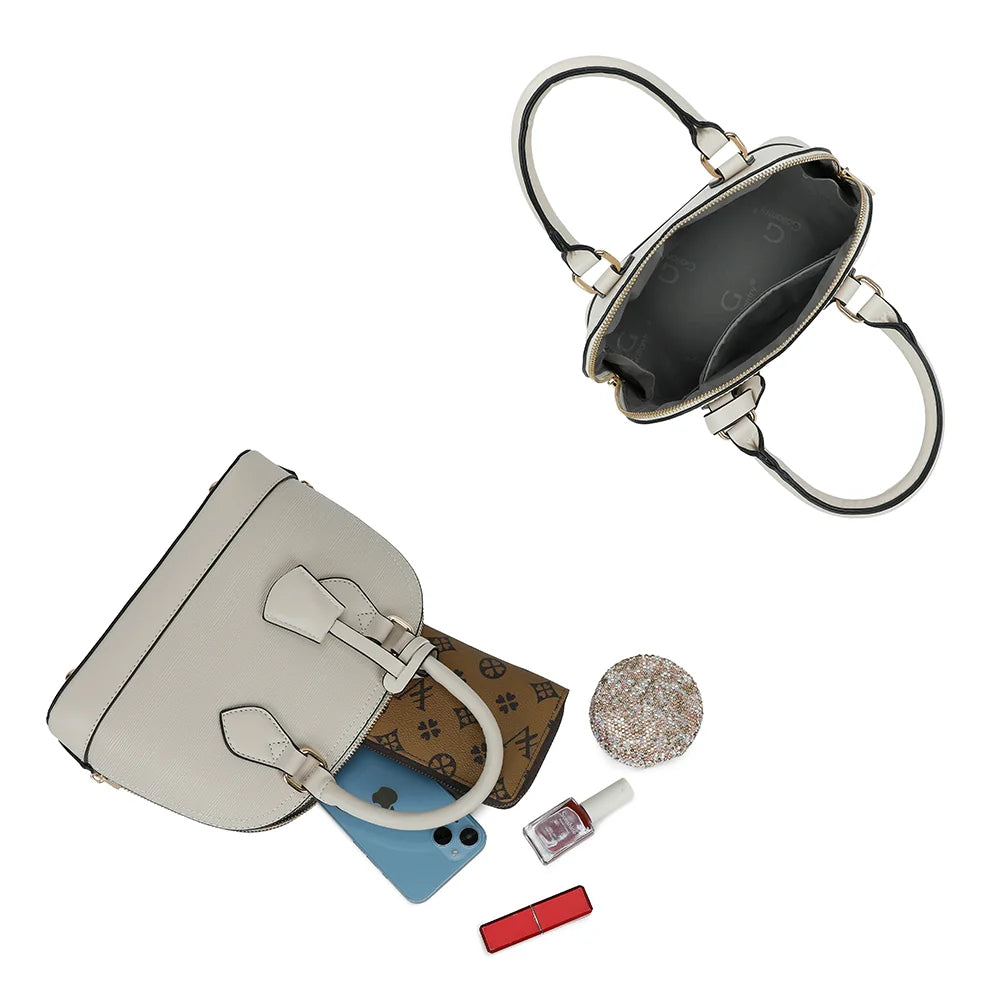 Intérieur de L'Éclat Mini or : compartiment zippé avec poche plaquée pour le téléphone et l’essentiel – réf. DQ-8596-5