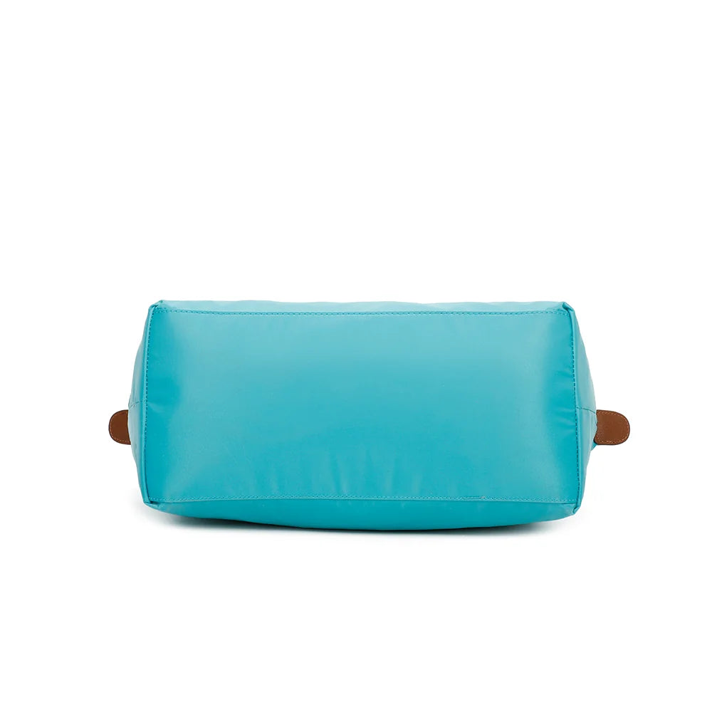 Dessous de La Balade (Large) turquoise claire, une base large en nylon pour un cabas qui tient bien – réf. Z-02