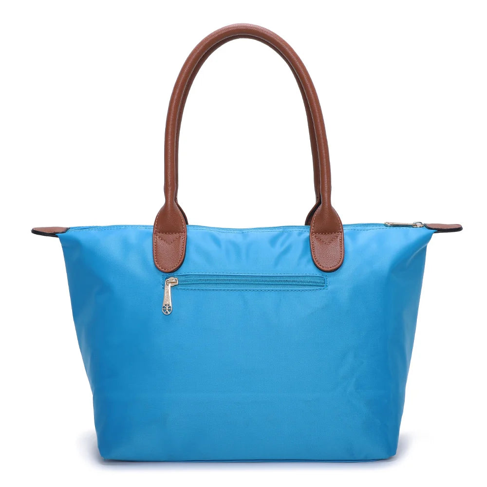 Dos de La Balade Medium bleu ciel : nylon uni et anses marron surpiquées cousues sur le haut du sac – réf. Z-03