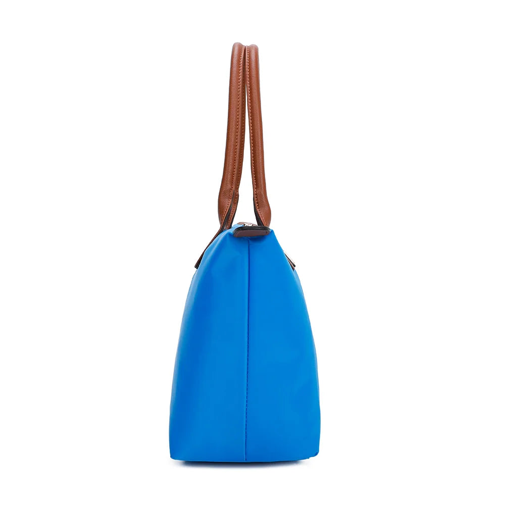 La Balade Medium bleu electrique de profil : 15 cm de profondeur et forme évasée vers la fermeture éclair – réf. Z-03