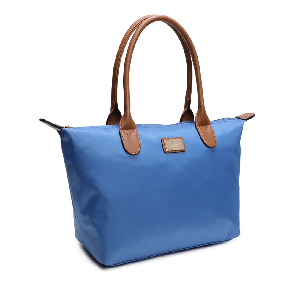 La Balade Medium bleu royal vue de trois quarts : silhouette évasée et pattes marron aux extrémités du zip – réf. Z-03