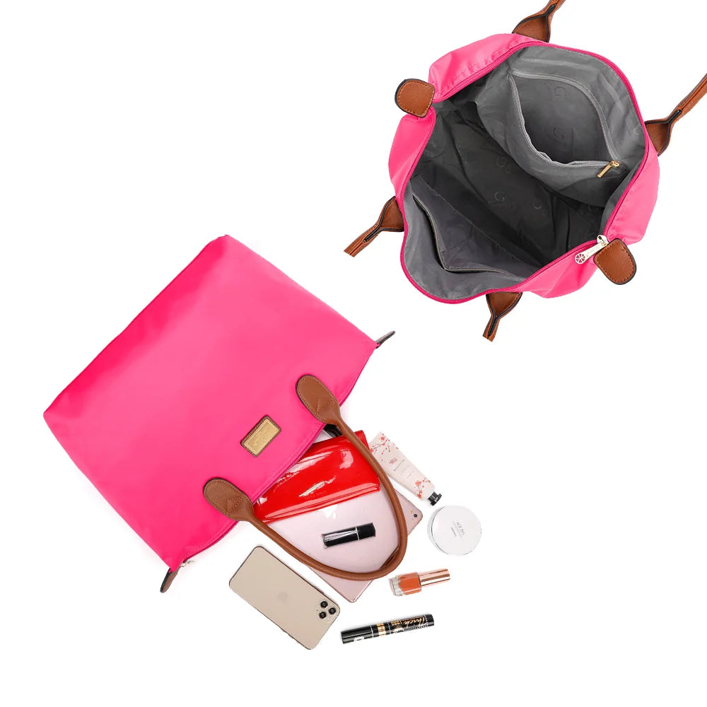 Intérieur de La Balade Medium fuschia claire : une poche zippée et des poches plaquées pour les petits essentiels – réf. Z-03