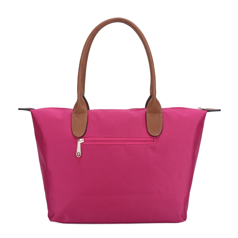 Dos de La Balade Medium fuschia : nylon uni et anses marron surpiquées cousues sur le haut du sac – réf. Z-03