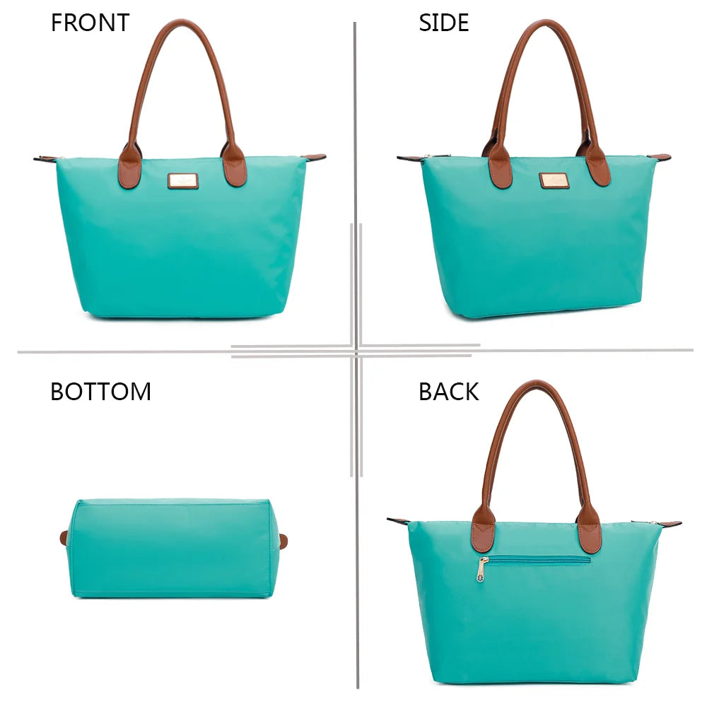 La Balade Medium vert emeraude sous quatre angles : face, profil, dessous et dos du sac en nylon – réf. Z-03