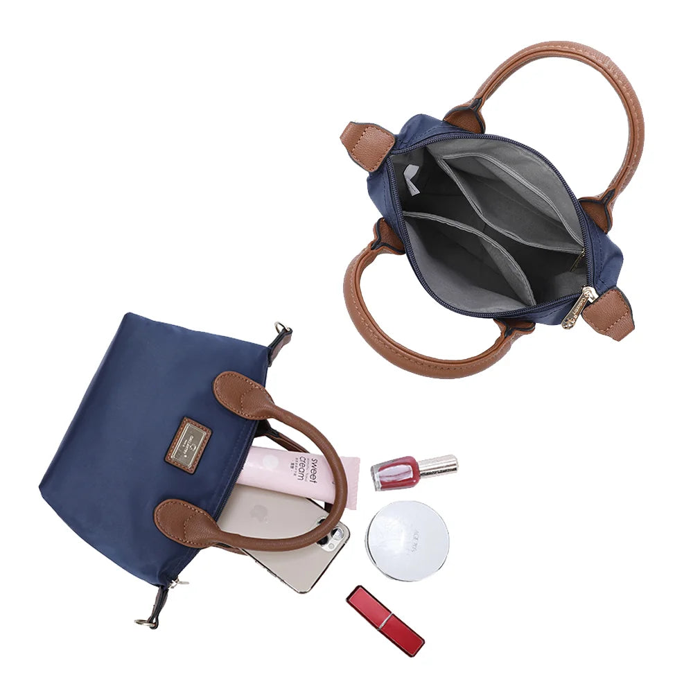 Intérieur zippé de La Balade (Mini) marine : doublure synthétique grise et poche intérieure plaquée – réf. Z-05