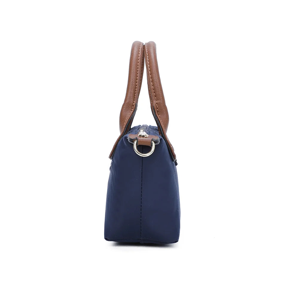 Profil de La Balade (Mini) marine : 8,5 cm de profondeur et attache latérale pour la bandoulière amovible – réf. Z-05