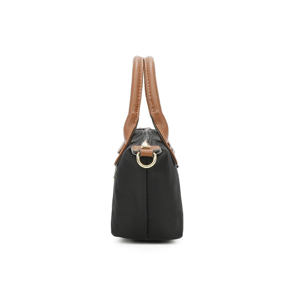 Profil de La Balade (Mini) noir : 8,5 cm de profondeur et attache latérale pour la bandoulière amovible – réf. Z-05
