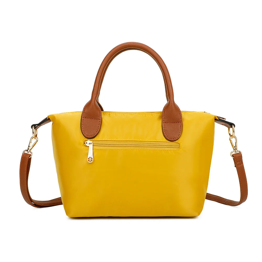 Dos de La Balade jaune : nylon lisse et poignées en simili cuir camel – réf. Z-01