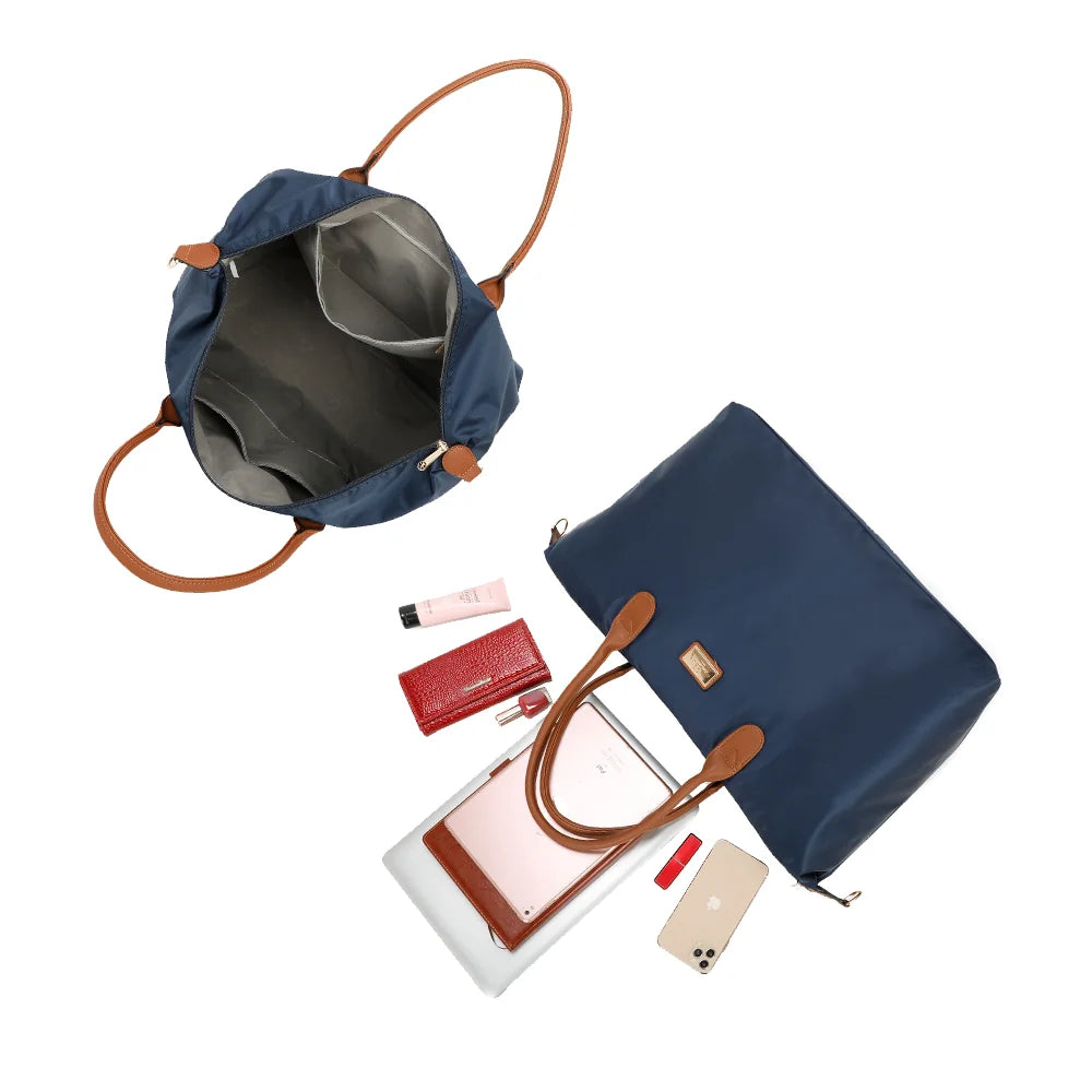 Intérieur de La Balade (XL) bleu foncé : grand compartiment zippé avec poches intérieures – réf. Z-04