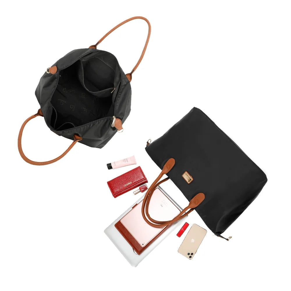Intérieur de La Balade (XL) noir : grand compartiment zippé avec poches intérieures – réf. Z-04