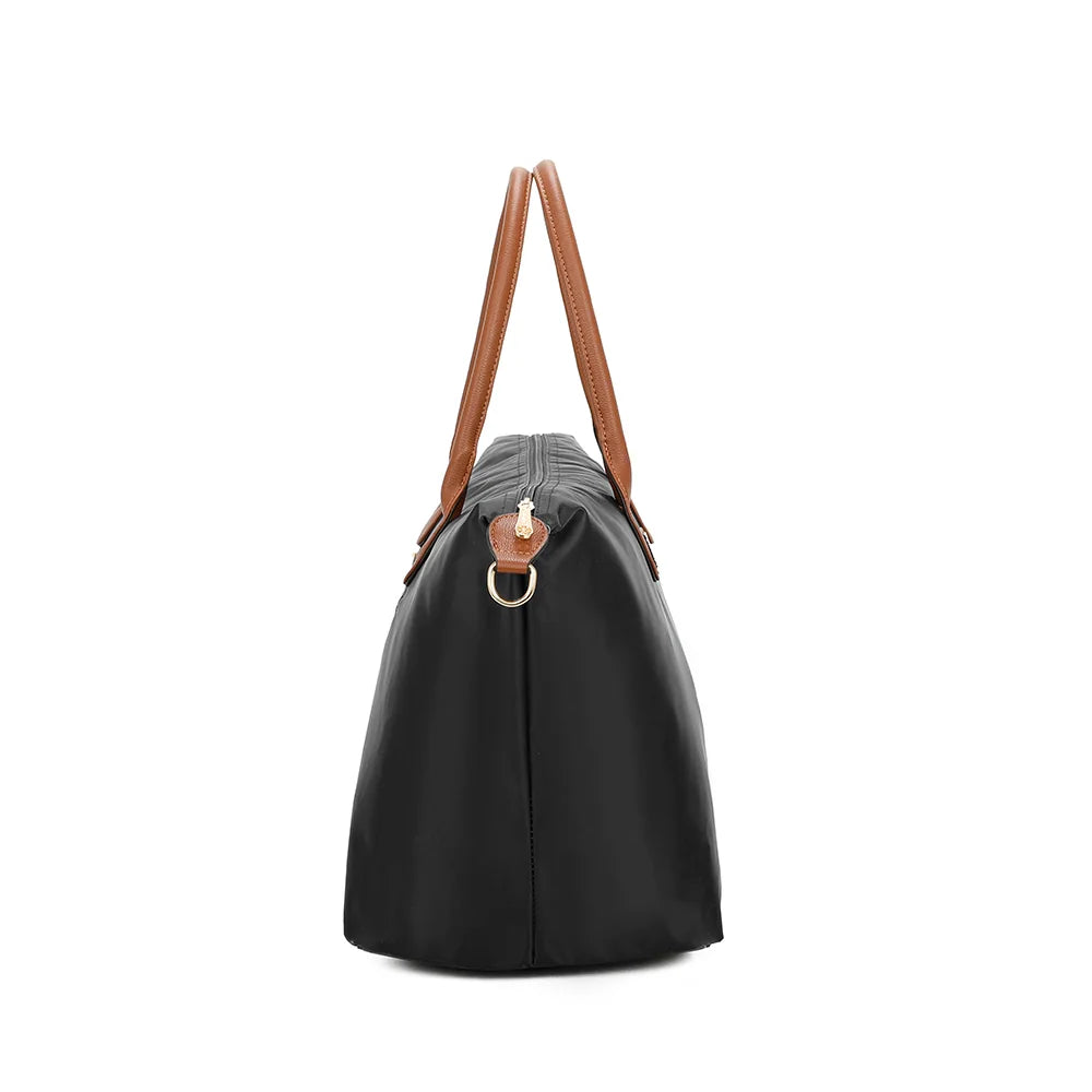Profil de La Balade (XL) noir : 23,5 cm de profondeur et anneau doré pour la bandoulière – réf. Z-04