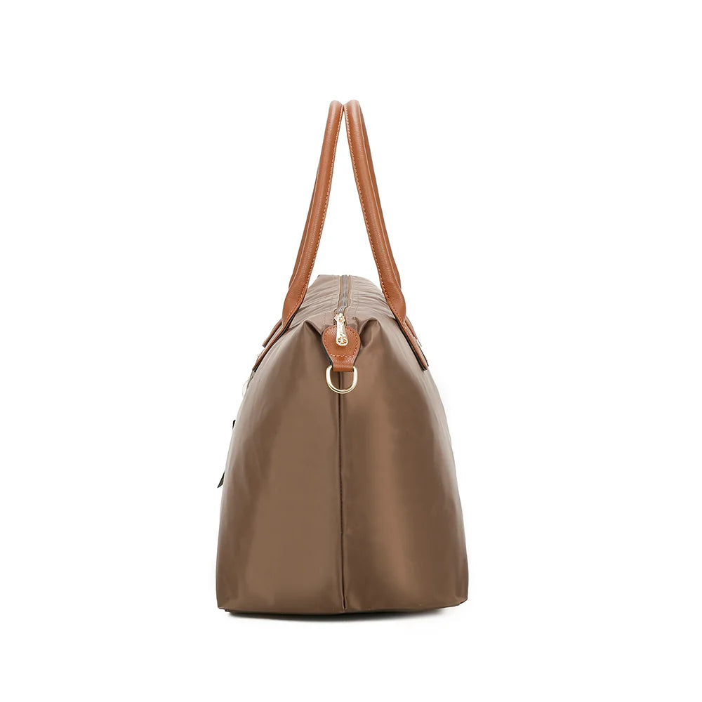 Profil de La Balade (XL) taupe foncé : 23,5 cm de profondeur et anneau doré pour la bandoulière – réf. Z-04