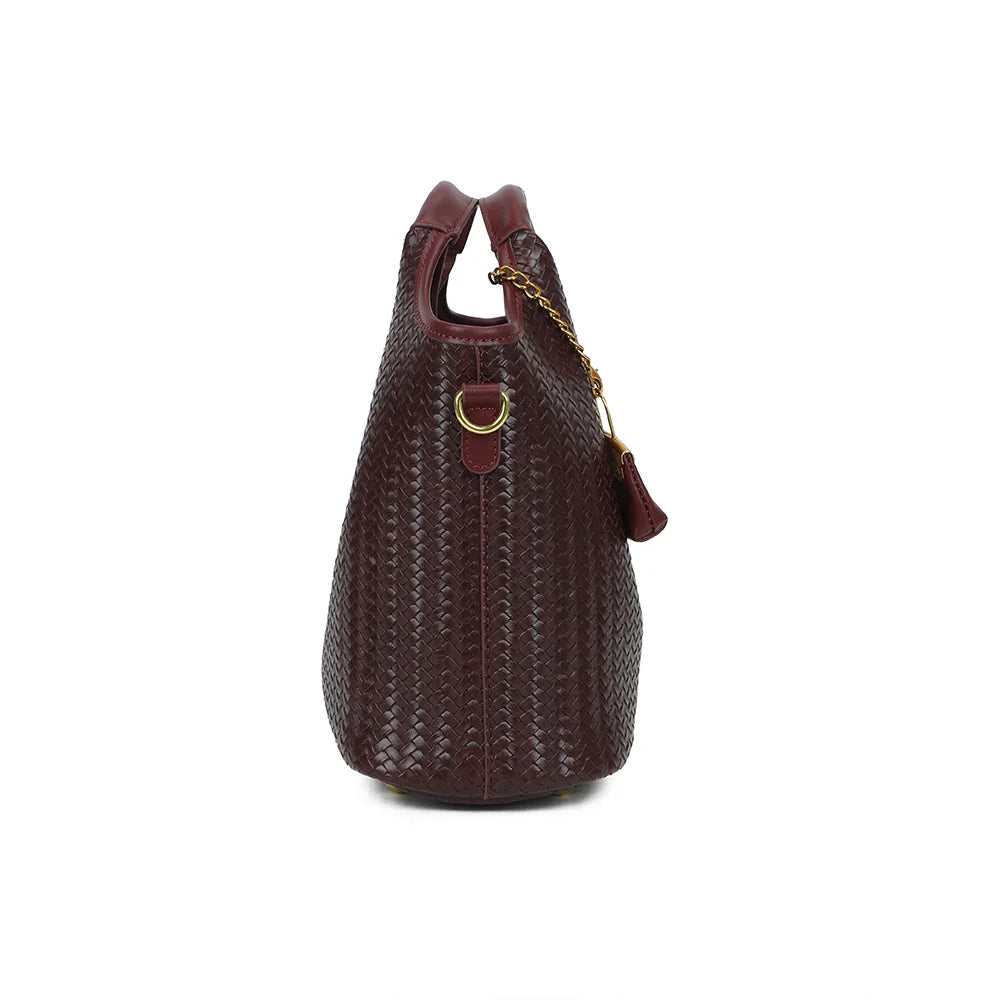 La Caramelle bordeaux de profil : anneaux et mousquetons dorés pour fixer la bandoulière amovible – réf. KJ-62074-1