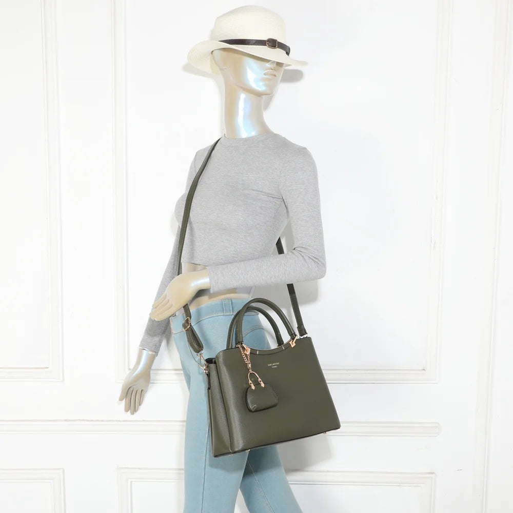 Sac à main femme La Cassia vert foncé porté à la main, élégant avec son mini porte-monnaie doré – réf. DQ-8676-2