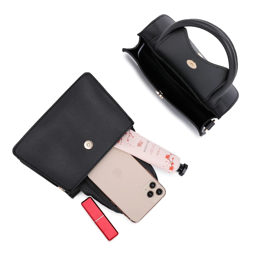 Intérieur de La Céleste noir : un smartphone, une crème pour les mains et un rouge à lèvres – réf. R-1635
