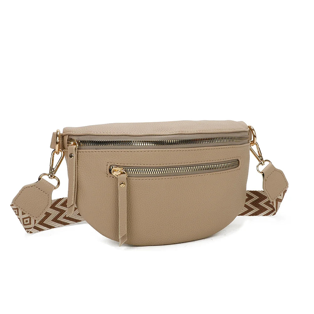 La Élégia taupe de trois quarts : silhouette arrondie et poche zippée frontale – réf. R-1926-1