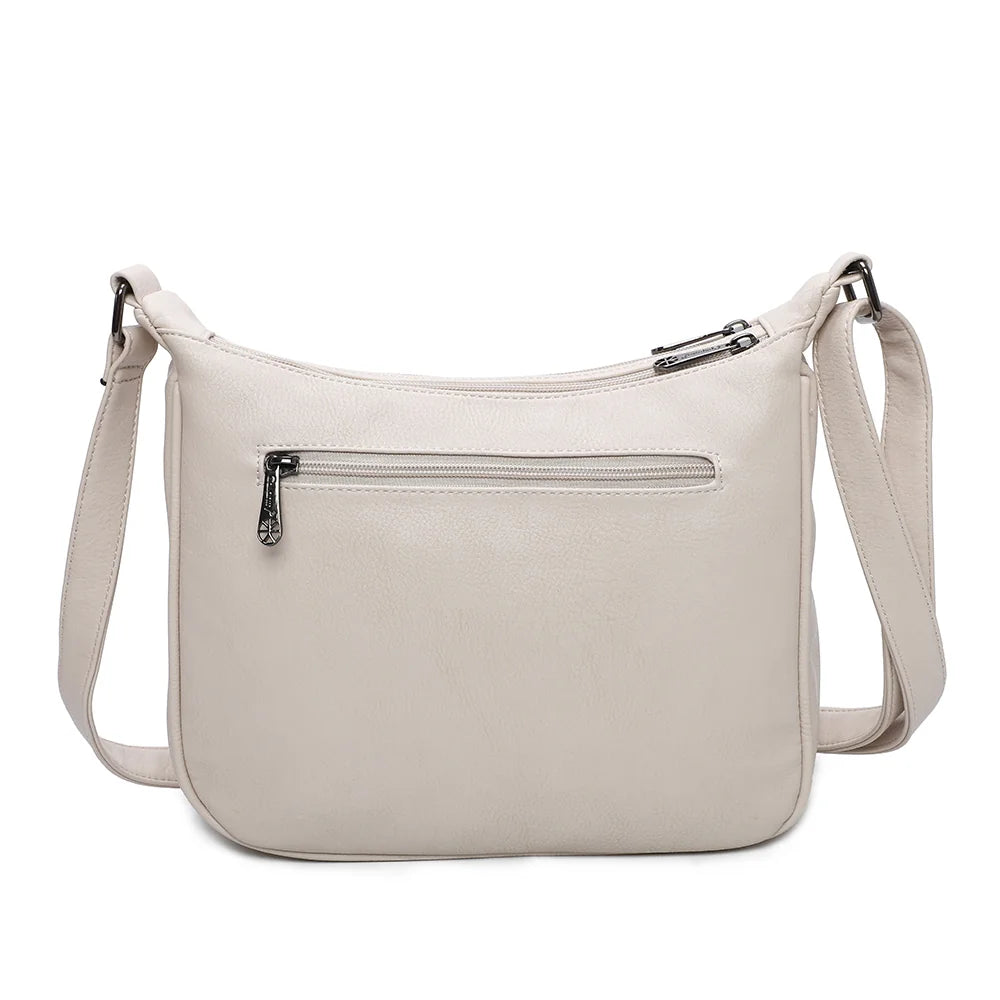 Dos du sac La Elya beige en simili cuir grainé, avec ses surpiqûres ton sur ton et sa bandoulière – réf. Z-83001