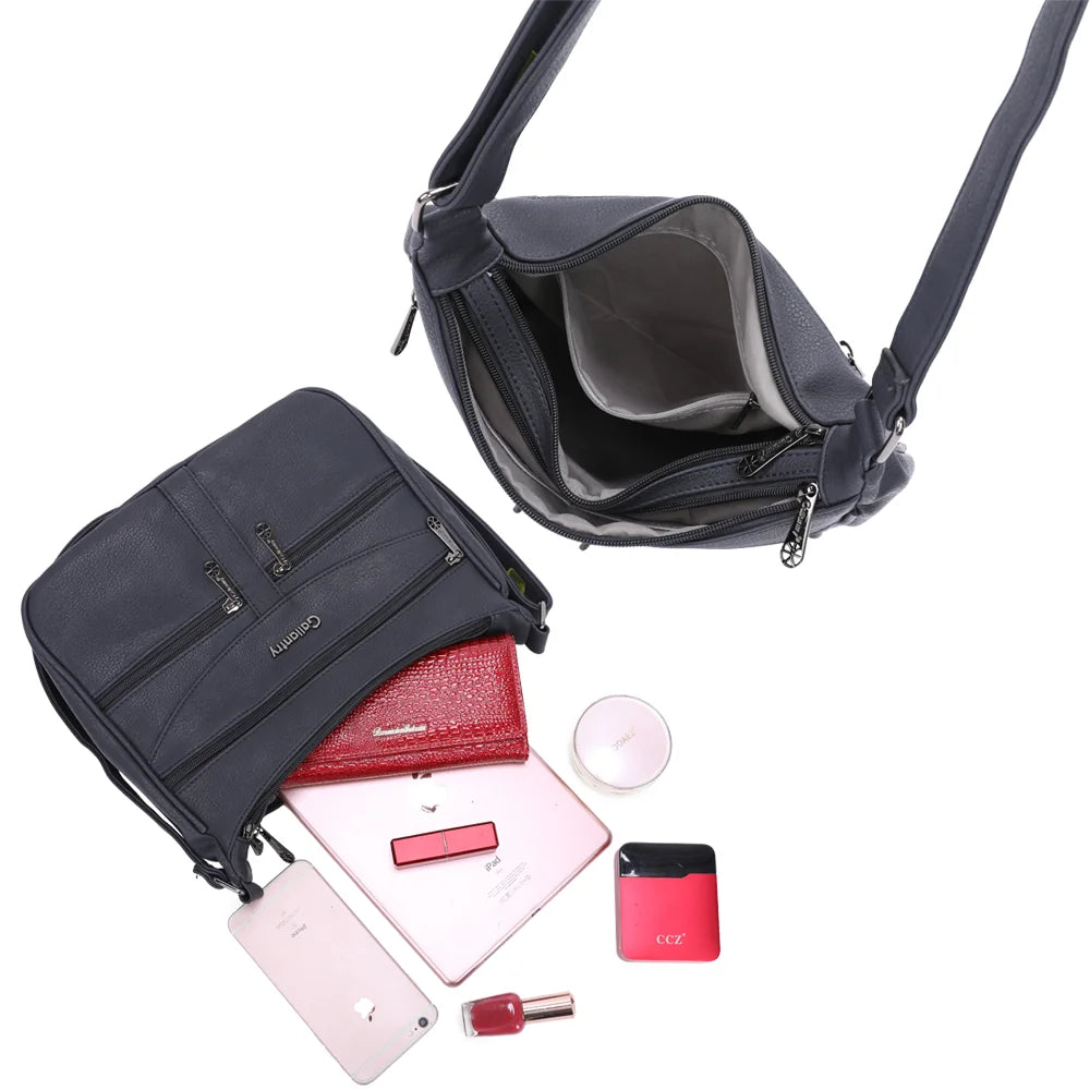 Intérieur de La Elya bleu foncé : plusieurs compartiments pour ranger téléphone, carnet et petits accessoires – réf. Z-83001