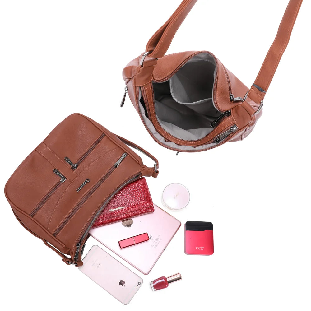 Intérieur de La Elya marron foncé : plusieurs compartiments pour ranger téléphone, carnet et petits accessoires – réf. Z-83001