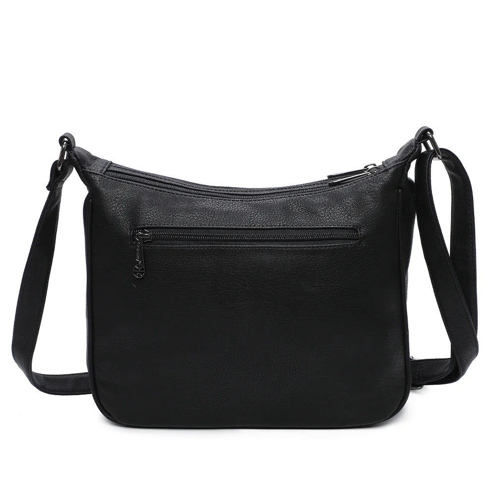 Dos du sac La Elya noir en simili cuir grainé, avec ses surpiqûres ton sur ton et sa bandoulière – réf. Z-83001