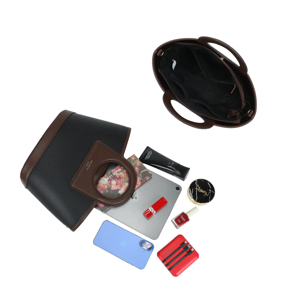 Intérieur du sac La Eulalie noir avec poches plaquées pour ranger téléphone et essentiels – réf. DQ-8737