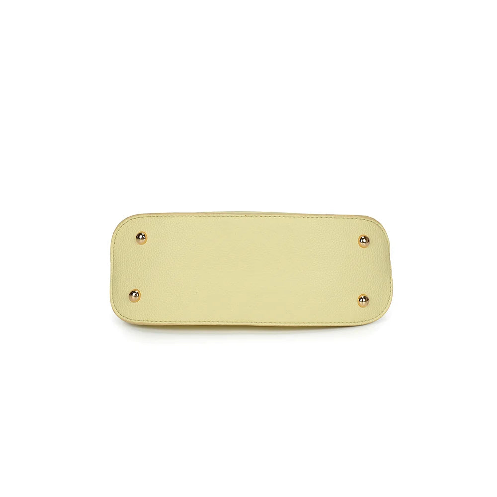 Dessous du sac La Isée jaune : base arrondie soulignée d’un rebord – réf. R-2063
