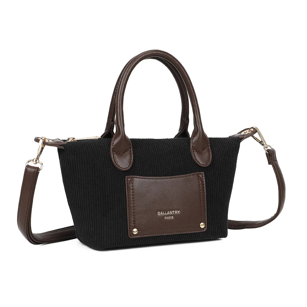 La Léandra noir vue de trois quarts : silhouette compacte, côtes verticales et anses arrondies assorties – réf. Z-05-8