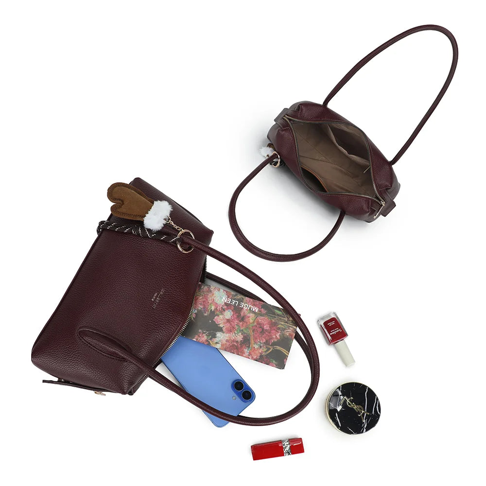 Intérieur de La Linotte bordeaux : grand compartiment doublé et poches pour téléphone, carnet et maquillage – réf. KJ-62100