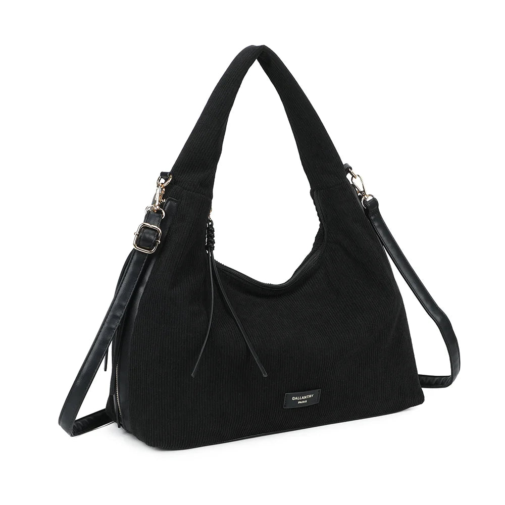 La Mélodie noir de trois quarts : silhouette souple et arrondie, zip latéral bordé façon cuir – réf. JC-53010