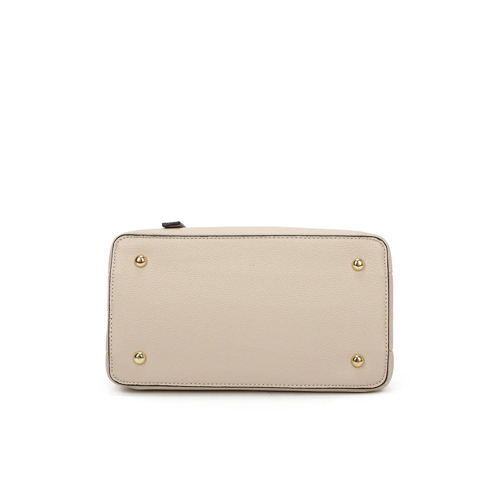 Dessous de La Moderne beige avec pieds en métal qui protègent le sac une fois posé – réf. R-1710