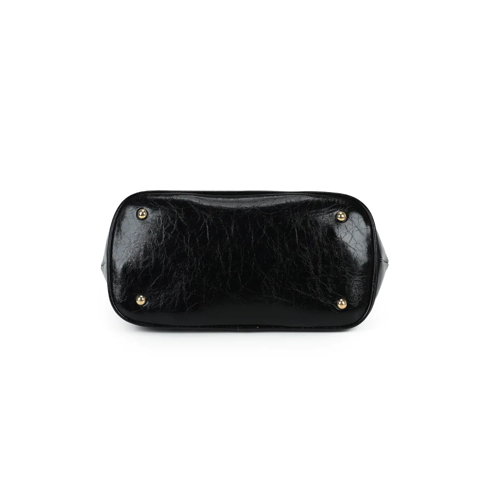Dessous de La Parure noir : base plate protégée par de petits pieds métalliques dorés – réf. R-2065