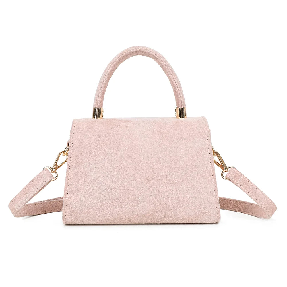 Dos de La Petite Élégante rose, lisse et épuré, avec sa poignée gainée aux embouts dorés – réf. HY-5406-5