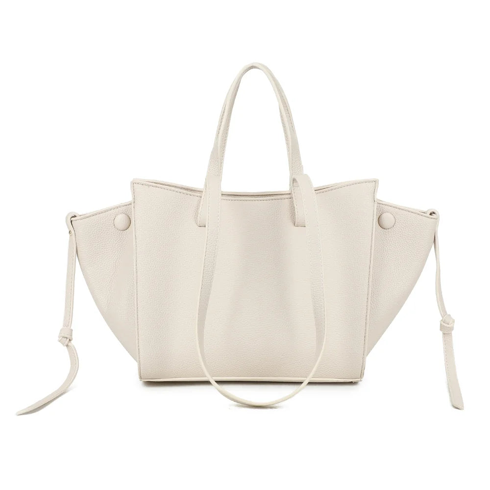 Dos du Laguna beige : surface unie en simili cuir grainé et longues anses pour l’épaule – réf. R-2029