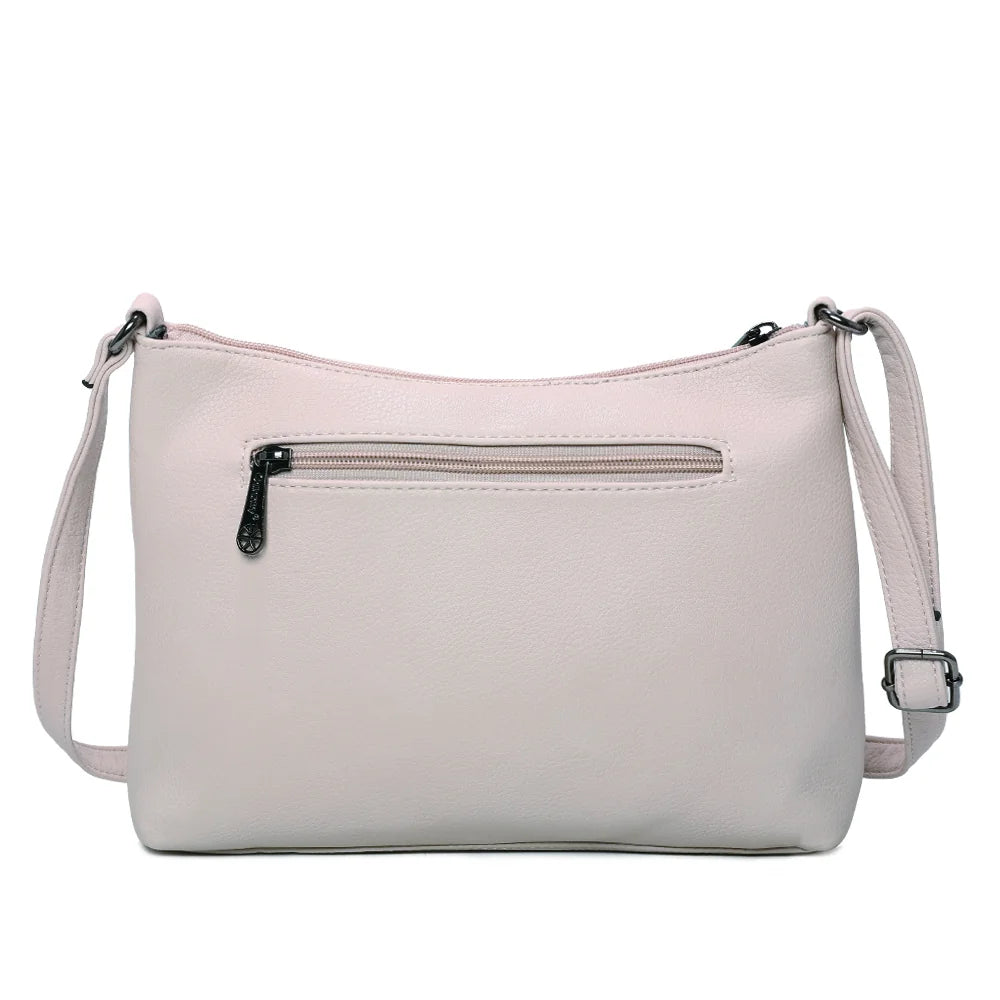 Dos du Le Auréane beige, simili cuir grainé et attaches de la bandoulière réglable – réf. Z-5103