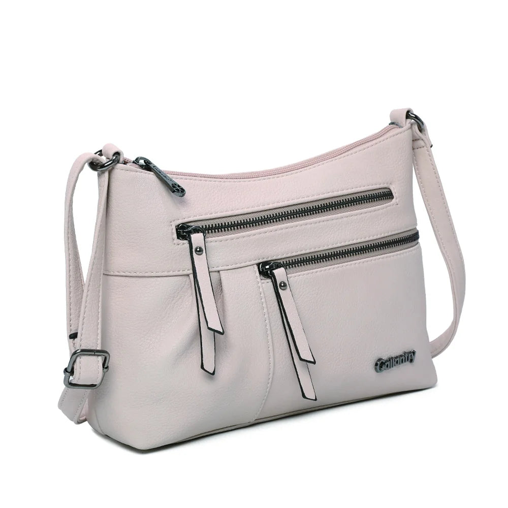 Le Auréane beige de trois quarts : silhouette souple et poches zippées à tirettes – réf. Z-5103