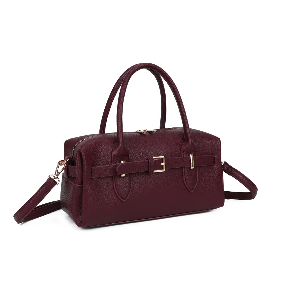 Le Castille bordeaux vu de trois quarts : silhouette allongée et structurée, zip à double curseur doré – réf. R-2064