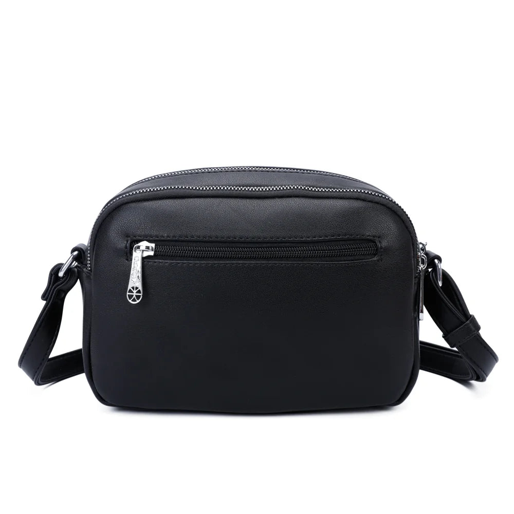 Dos du Charme Compact noir, surface synthétique lisse et surpiqûres ton sur ton – réf. G-7455