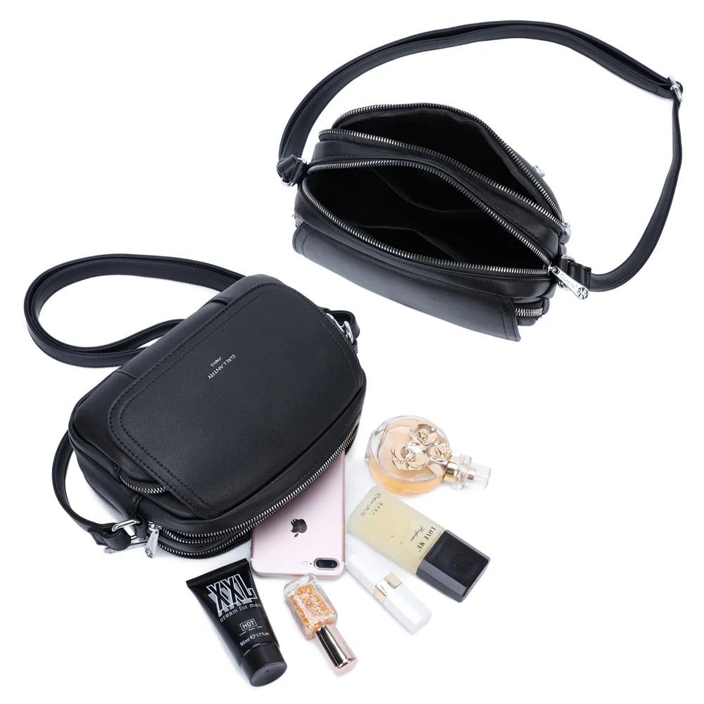 Intérieur du Charme Compact noir : deux compartiments zippés pour smartphone et essentiels – réf. G-7455