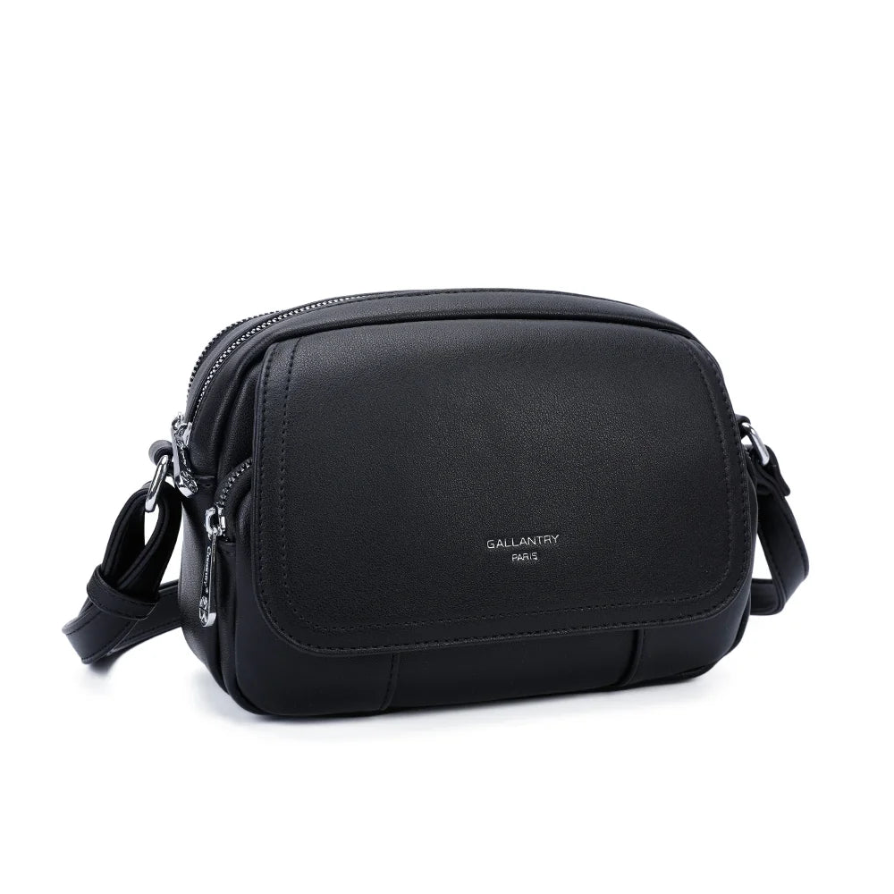 Le Charme Compact noir vu de trois quarts : double zip sur le dessus et poche avant zippée – réf. G-7455