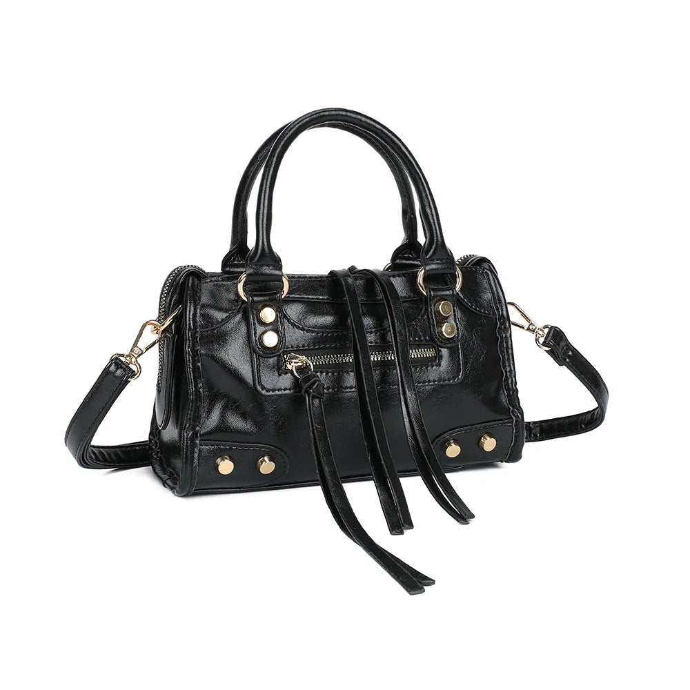 Le Dorian noir de trois quarts : silhouette compacte et structurée, zip frontal doré – réf. KJ-62088-1