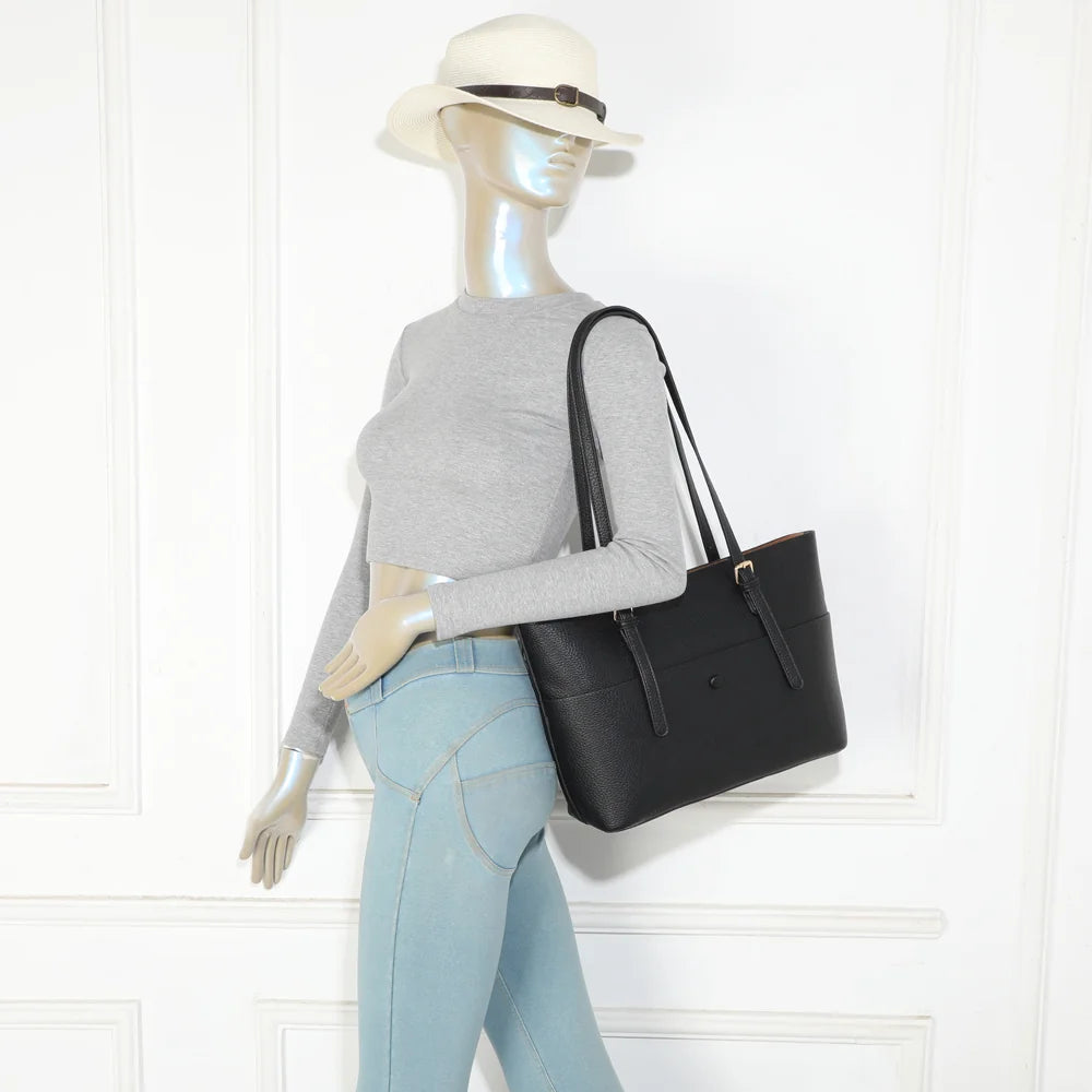 Sac cabas Le Grandor noir porté à l’épaule par une femme, format idéal pour le quotidien – réf. DG-5824