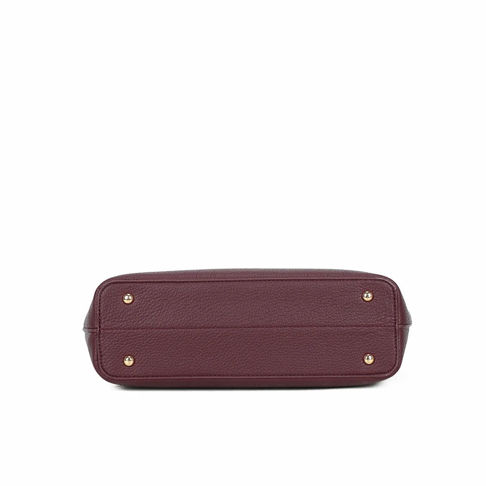 Dessous du cabas Le Hudson coloris bordeaux, en simili cuir grainé assorti au reste du sac – réf. R-2054