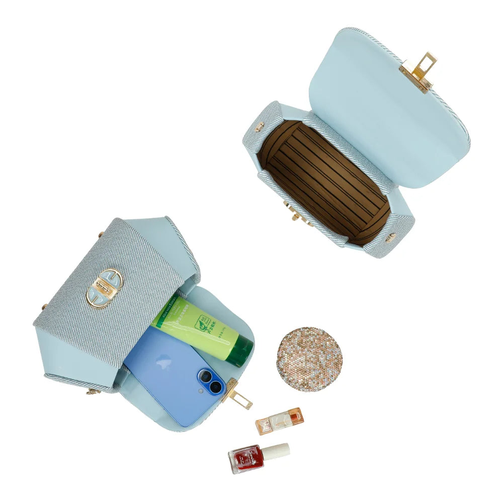 Intérieur du Le Léa bleu clair : compartiment principal pour téléphone, rouge à lèvres et essentiels – réf. YL-26008