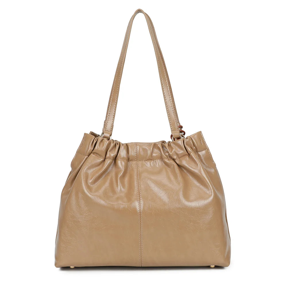 Dos du Mahé taupe foncé : surface lisse et brillante, couture centrale et anses longues ton sur ton – réf. A-9170