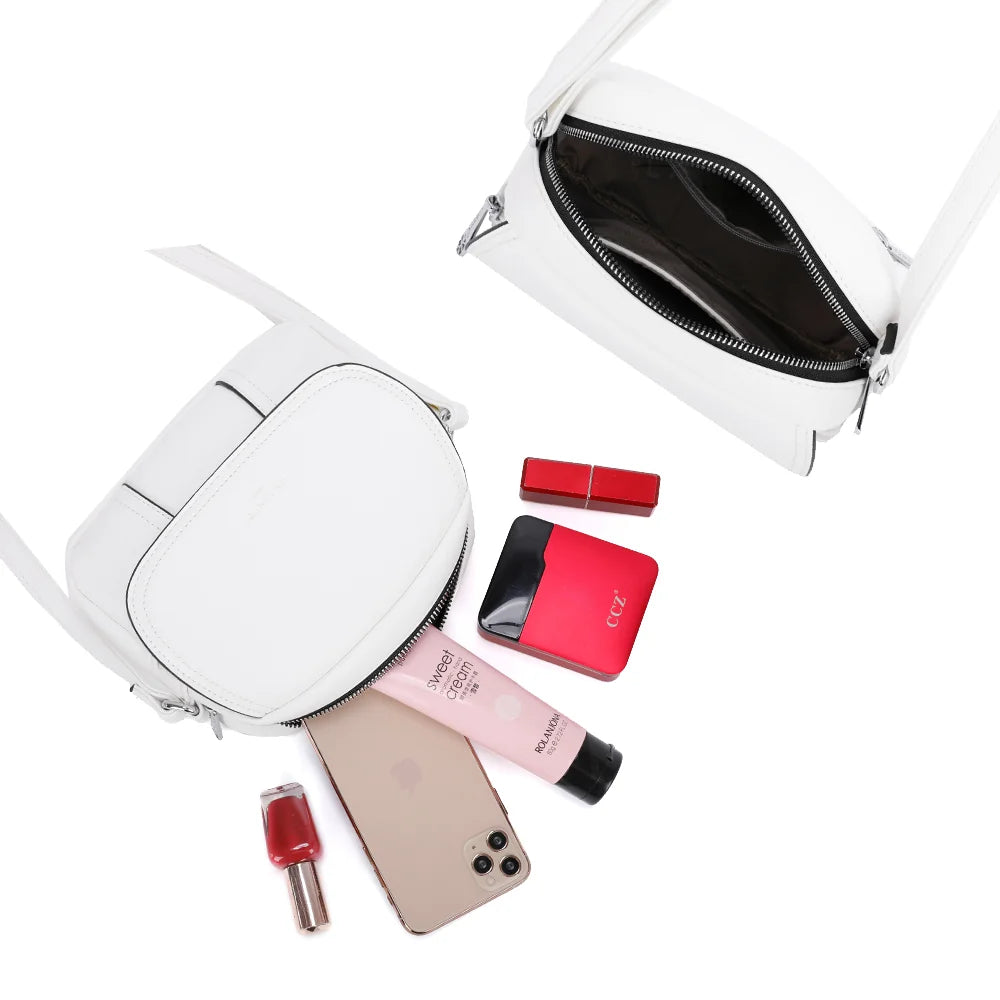 Intérieur du Le Mélina blanc : compartiment zippé pour téléphone, rouge à lèvres et poudrier – réf. KJ-62004